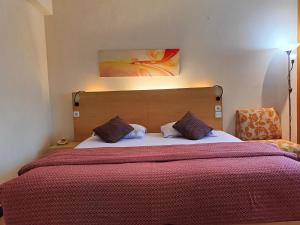 Postel nebo postele na pokoji v ubytování Lux Tychi Hotel