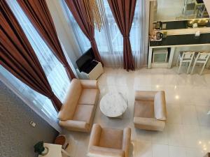 TV a/nebo společenská místnost v ubytování Lux Tychi Hotel