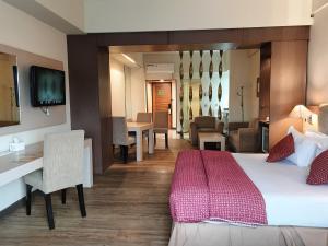 Postel nebo postele na pokoji v ubytování Lux Tychi Hotel
