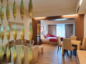 Postel nebo postele na pokoji v ubytování Lux Tychi Hotel