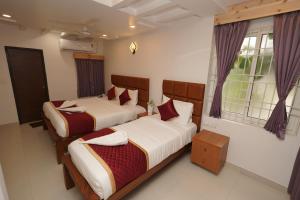 Ένα ή περισσότερα κρεβάτια σε δωμάτιο στο Hotel Devi Paradise