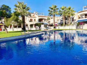 Bazén v ubytovaní Gound Floor Bungalow Jumilla III Playa Flamenca alebo v jeho blízkosti