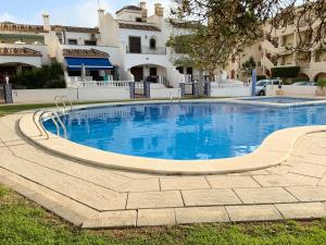 Bazén v ubytovaní Gound Floor Bungalow Jumilla III Playa Flamenca alebo v jeho blízkosti