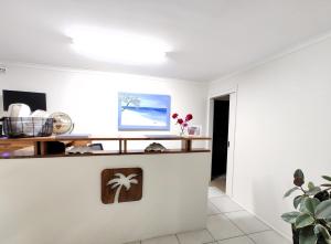 TV a/nebo společenská místnost v ubytování Pacific Palms Motor Inn