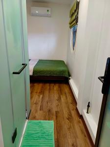 Ein Bett oder Betten in einem Zimmer der Unterkunft Boom Casa Homestay