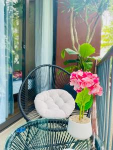Ein Balkon oder eine Terrasse in der Unterkunft Boom Casa Homestay