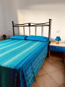 Katil atau katil-katil dalam bilik di Apartment in Olbia Murta Maria