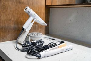a hair dryer sitting on top of a counter at Cocoa House in Jeonju