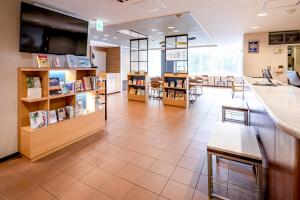 TV a/nebo společenská místnost v ubytování Comfort Hotel Narita