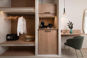 a walk in pantry with a cupboard at Nikos & Maria Studios II in Laganas
