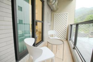 A balcony or terrace at 十月 Mooon House