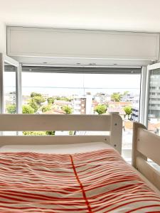 Ένα ή περισσότερα κρεβάτια σε δωμάτιο στο FabFour Apt CENTRALE - Piazza Fontana