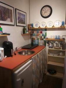 Η κουζίνα ή μικρή κουζίνα στο La appartement des rosiers