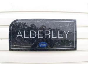 un cartello con la scritta Alberley su un piatto di 50A ALDERLEY at Hoburne bashley a New Milton