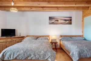 Postel nebo postele na pokoji v ubytování Villa Grenzenlos