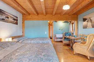Postel nebo postele na pokoji v ubytování Villa Grenzenlos
