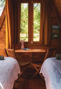 Postel nebo postele na pokoji v ubytování Dumbo Eco Camp