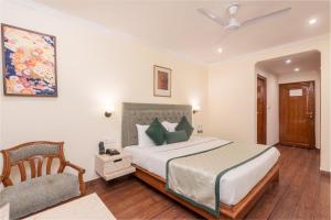 Tulip Inn Green Castle Mall road客房内的一张或多张床位