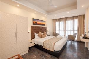 Tulip Inn Green Castle Mall road客房内的一张或多张床位
