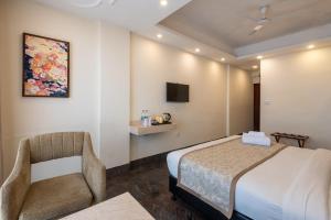 Tulip Inn Green Castle Mall road客房内的一张或多张床位