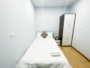 Postel nebo postele na pokoji v ubytování Eco Nest Hotel Đình Ngang