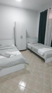 Postel nebo postele na pokoji v ubytování Apartman SPLENDID