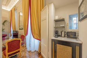 Kuchyňa alebo kuchynka v ubytovaní Palazzo Monga Boutique Guesthouse