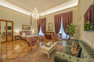 Posteľ alebo postele v izbe v ubytovaní Palazzo Monga Boutique Guesthouse
