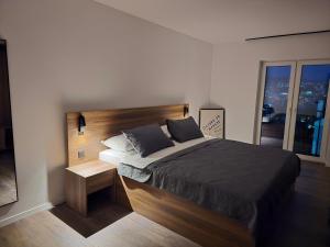 Postel nebo postele na pokoji v ubytování Fole Apart Hotel