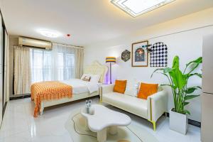 Ein Bett oder Betten in einem Zimmer der Unterkunft Guangzhou City Center Apartment