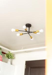 a ceiling fan in a living room at Plumera Condo Near Airport Malls & Schools with Elevator in Lapu Lapu City