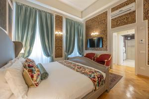 Posteľ alebo postele v izbe v ubytovaní Palazzo Monga Boutique Guesthouse