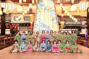 a group of women in kimonos posing for a picture at Wyndham Lynn Times Thanh Thuỷ Phú Thọ Hotel in Xuân Vi