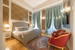 Posteľ alebo postele v izbe v ubytovaní Palazzo Monga Boutique Guesthouse