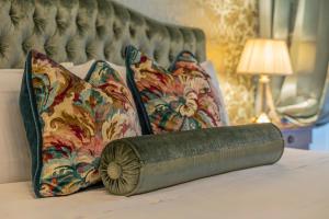 Posteľ alebo postele v izbe v ubytovaní Palazzo Monga Boutique Guesthouse