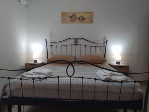 Ένα ή περισσότερα κρεβάτια σε δωμάτιο στο Antico Borgo - Via Napoli, 2