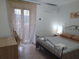 Postel nebo postele na pokoji v ubytování Antico Borgo - Via Napoli, 2