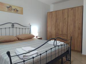 Postel nebo postele na pokoji v ubytování Antico Borgo - Via Napoli, 2