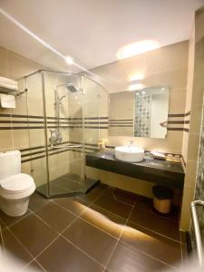 Koupelna v ubytování Ngoc Linh Luxury Hotel