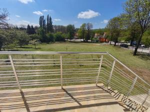 an empty bleachers in a park with a field at Depandans Stefan in Nevesinje