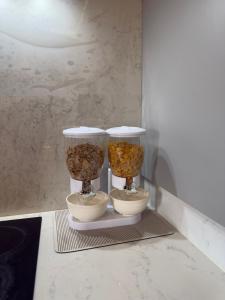 Φωτογραφία από το άλμπουμ του Chic Cozy Room with PS5, Mini Bar & Shared Spaces σε Wainscot