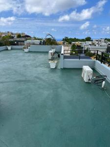 a roof with water on top of a building at Villa Christine in Ocho Rios