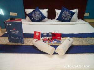 Postel nebo postele na pokoji v ubytování Hotel Mayur