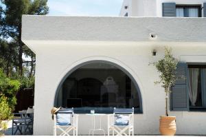 Afbeelding uit fotogalerij van Azure Bianca Beach Villa in Diaporos