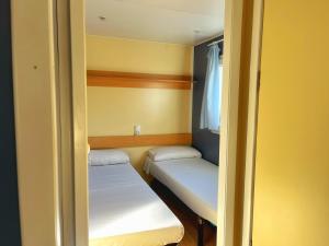 Postel nebo postele na pokoji v ubytování ARES Ecoresort