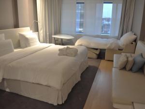 Voodi või voodid majutusasutuse Pullman Brussels Centre Midi toas