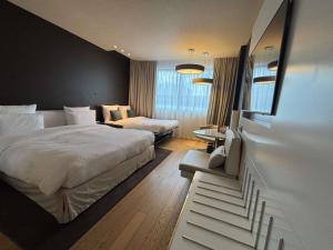 Voodi või voodid majutusasutuse Pullman Brussels Centre Midi toas