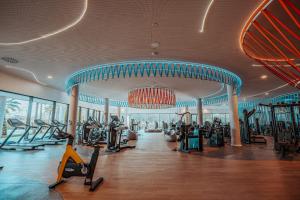 a gym with treadmills and elliptical machines at Higuerón 5821 in Málaga