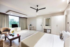 Gulta vai gultas numurā naktsmītnē Skon Boutique by Orion Hotels