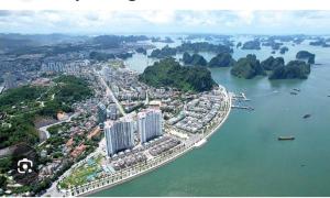 an aerial view of a city on the water at Sea Moon full Apartment in Ha Long